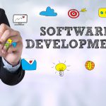 SOFTWARE DEVELOPMENT Businessman drawing Landing Page on blurred abstract background